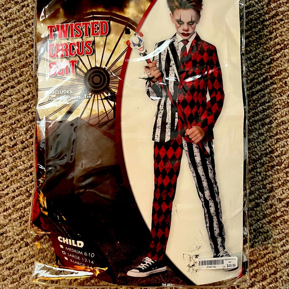 Kids twisted circus suit comes with jacket, pants and tie. Large 12/14